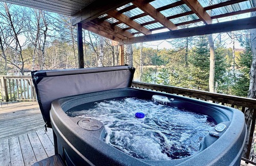 Saint-Didace Ski Chalet | Lake front in the woods. Newly furnished with SPA
