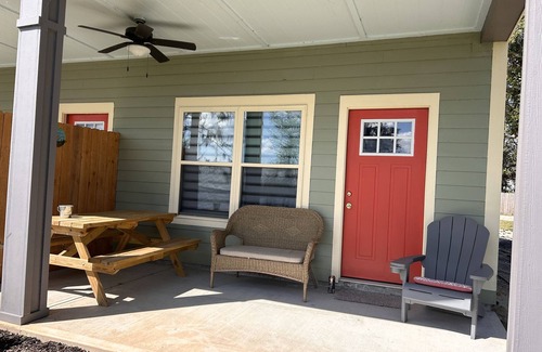 Southport Cottage | Lake Front Rental in Panama City with Kayak, EV Charger, & Dock - Dog Friendly