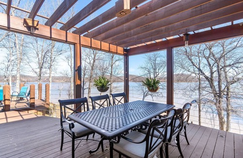 Stewart House | Lake front with dock and boat ramp