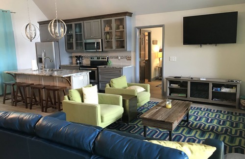 Jacksons' Gap House | Lake Martin home, lakefront, renovated house, no stairs- beach area
