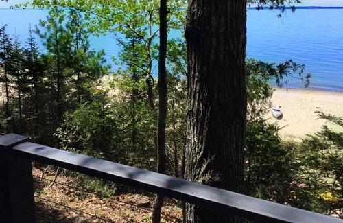 Ellsworth House | Lake Michigan Sunsets and sandy beachfront home on Grand Traverse Bay
