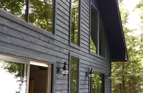 Ellsworth House | Lake Michigan Sunsets and sandy beachfront home on Grand Traverse Bay
