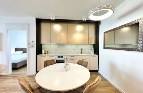 Trzebiatow Apartment | Lake pool view with private beach access Garage