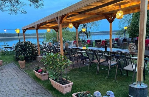 Mellensee Apartment | Lake view apartment direct water access Restaurant am Wildpark
