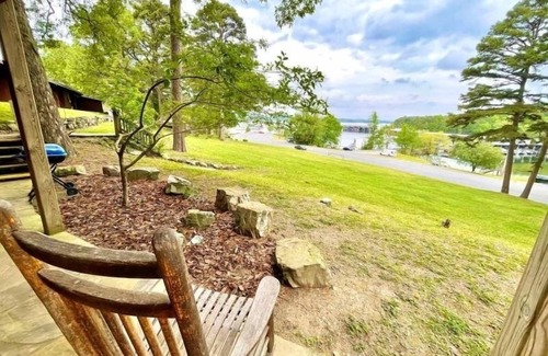 Mount Ida Apartment | Lake view queen Guest Room with two queens, sleeper sofa and deck overlooking Lake Ouachita. by RedAwning