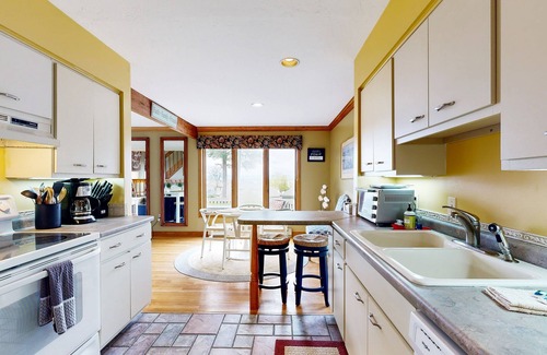 Gilford House | Lake-view townhome with lakefront swimming, pools, tennis/pickleball