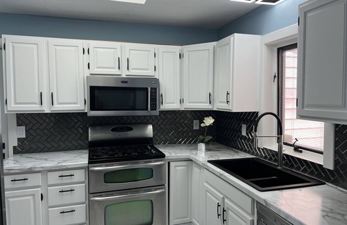 Enchanted Hills Condo | Lake Wawasee 2 Bedroom Premier Condo on Channel with 1 Boat Slip, Sleeps 6,