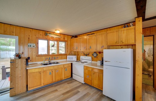 Manistique Cabin | Lakefront Cabin w/Private Dock & Beach!