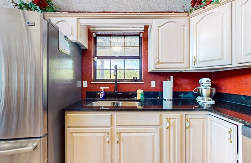 Sevierville Cabin | Lakefront cabin with views, boat ramp, dock, hot tub, & free attraction tickets