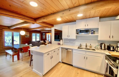 Plymouth House | Lakefront cabin with dock, hot tub, fire pit!