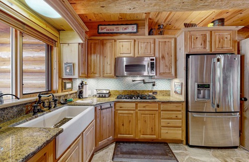 Tamarack Resort Cabin | Lakefront cabin with game room, sauna, lake views, private beach, grill, deck