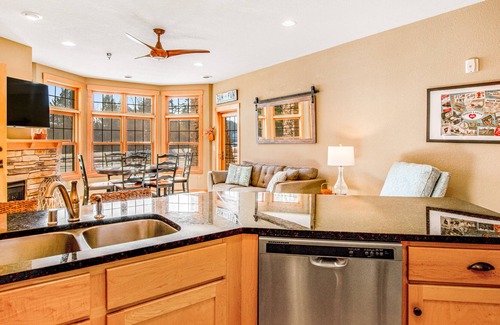Three Lakes Condo | Lakefront condo with fireplace, hot tubs, heated pool, tennis, gym, firepit, AC