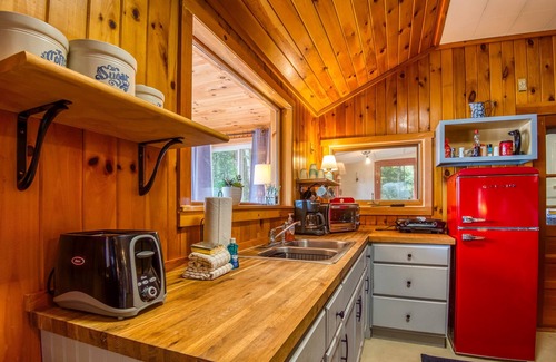 Newfield Cottage | Lakefront Cottage with Private Dock and Kayaks. Dog-Friendly