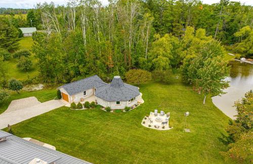 Charlevoix House | Lakefront Gem with Private Dock and Yard in Charlevoix