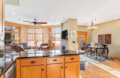 Three Lakes Condo | Lakefront, ground-floor condo with fireplace, patio, private grill & firepit