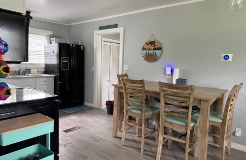 Thomas Drive House | Lakefront Home + Private Beach + Firepit + Kayaks + Pets