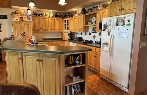 Burtrum House | Lakefront home ice fishing snowmobile trail access with beautiful sunrise view