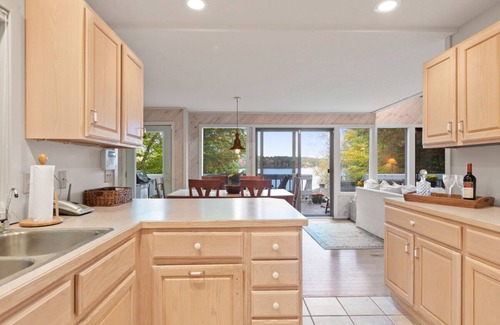 Moultonborough House | Lakefront home on the lake with game room, private beach, and boat dock