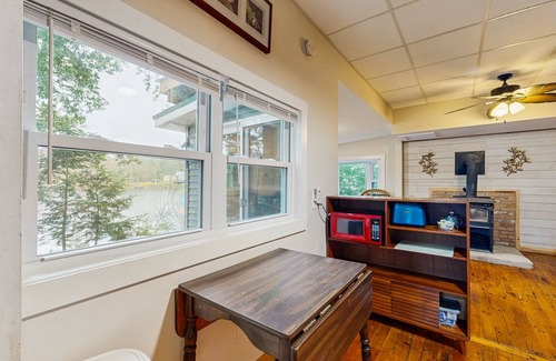 Augusta Cottage | Lakefront Home on Togus Pond with 2 Decks, Great View & Shared Canoe/Firepit