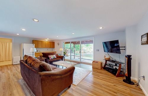 Raymond House | Lakefront home with amazing sunrise & sunset views, game tables & water toys