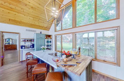 Paw Paw House | Lakefront home with spacious decks, lake views, hot tub, gas grill, & W/D