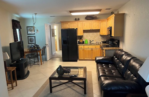 Babson Park House | Lakefront home with white sand beach and private boat dock on Crooked Lake.