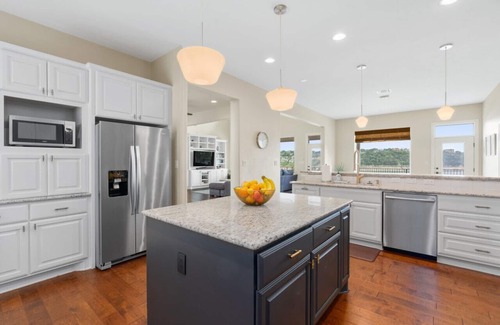 Point Venture House | Lakefront Home with Captained Part Boat, Private Dock, Beach, Game-room