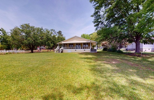 Prosperity House | Lakefront home with incredible sunset view, private dock, screened porch, and AC