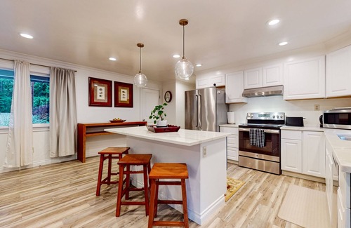 Snoqualmie House | Lakefront home with private dock, lake views, firepit, & wood stove