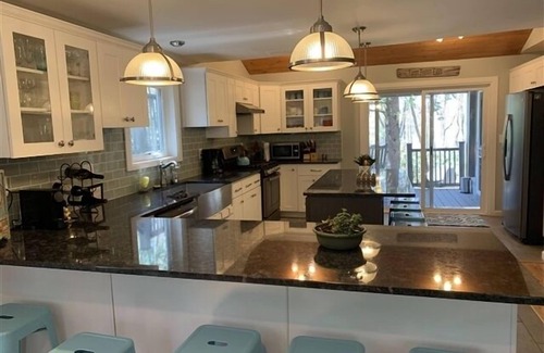 Pocono Pines House | Lakefront! Large lakefront home, familyroom, sunroom, with decking to enjoy the view!