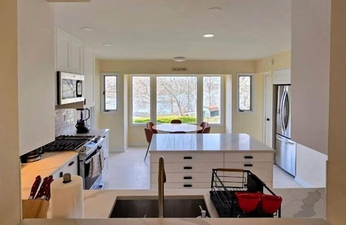 Walton Park House | Lakefront retreat with stellar water views just a short drive from West.