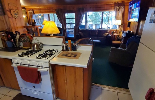 Frederic House | Lakefront-Semi Rustic Cabin-8.5 acres. Woods and lake, nature at its finest!