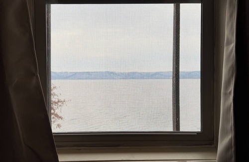 Brice Prairie Apartment | Lakefront studio. Natural setting, sunsets, kayaks, fishing dock, paved walking