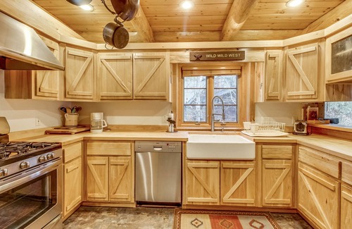 Sandpoint House | Lakefront true log home w/private hot tub, dock & heated floors