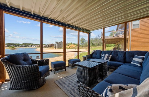 New Lisbon House | Lakehouse on Beach Lake, Wi Hot Tub and Screened in Porch near Castle Rock Lake