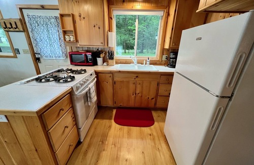 Kents Hill House | Lakehouse with 100ft of private waterfront on Lovejoy Pond