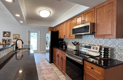 Florida South Atlantic Coast House | Lakehouse with pool in quiet setting