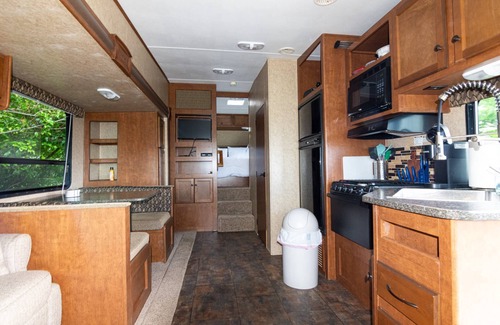 Heath Condo | Lakeside Getaway: Pool, Sauna, 2BR Over Garage Condo and RV, Fishing, Playground, Basketball Court!