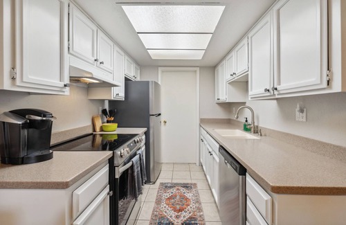 Desert Shores Condo | LAKEVIEW CONDO! Walking Paths, Pickleball, Pool/Spa