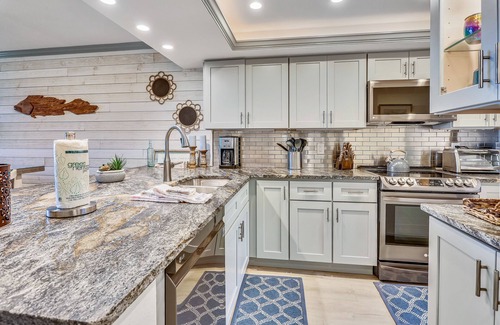 Sunset Beach Condo | Land's End 202 building 10 Stunning beach front, complete remodel!