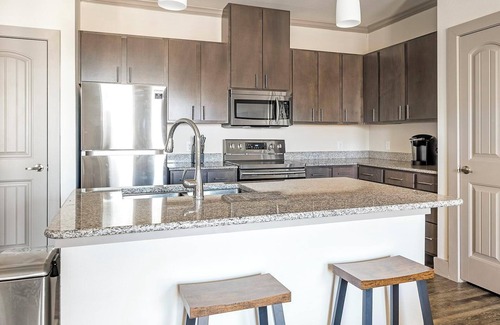 Manor Apartment | Landing at The Flats at Shadowglen - 1 Bedroom .