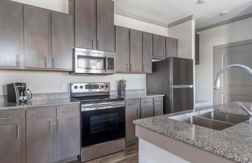 Manor Apartment | Landing at The Flats at Shadowglen - 1 Bedroom .