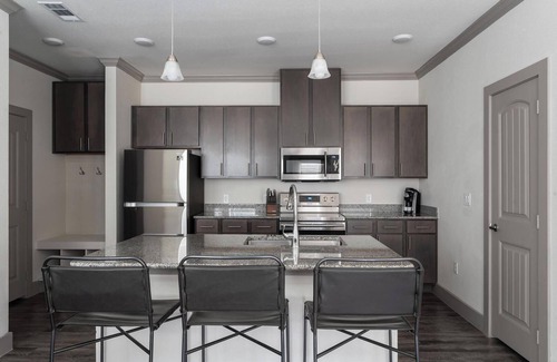 Manor Apartment | Landing at The Flats at Shadowglen - 1 Bedroom .