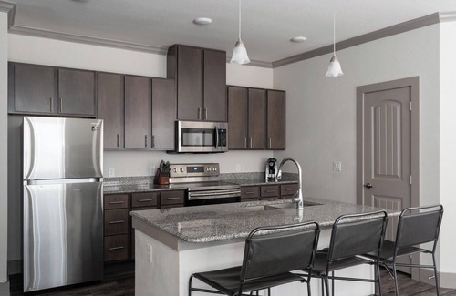 Manor Apartment | Landing at The Flats at Shadowglen - 1 Bedroom .
