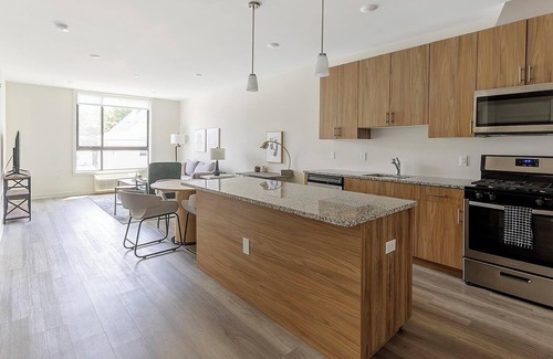 Carteret Apartment | Landing | Stylish 1BD, Rooftop Lounge, Gym