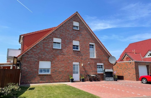 Norddeich Apartment | " Lantern on the 1st floor " cozy and bright, family-friendly apartment