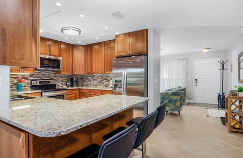 East Naples House | Larg heated pool, 3 bdrm, 2 bath, fast wi-fi, ps3, 4 smart TVs, large lanai with 2 covered areas.