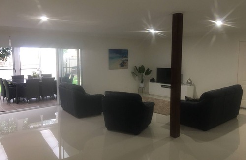 Salamander Bay House | Large 6 bed home, walk to water, restaurants, pub, club, coffee, use of kayaks.
