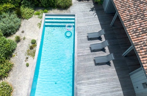 Loix House | Large architect-designed house with swimming pool and yoga studio