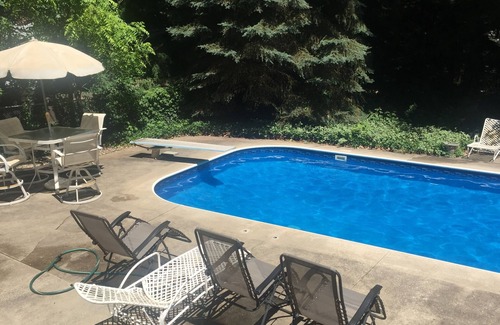 Macatawa House | Large family home with private POOL and hot tub on heavily wooded lot